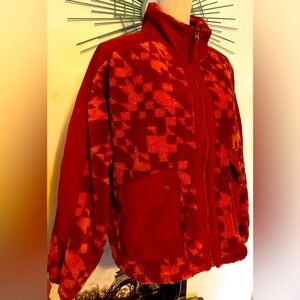 NWT JoyLab jacket in size XL a burgundy color. Two large pockets in the front.